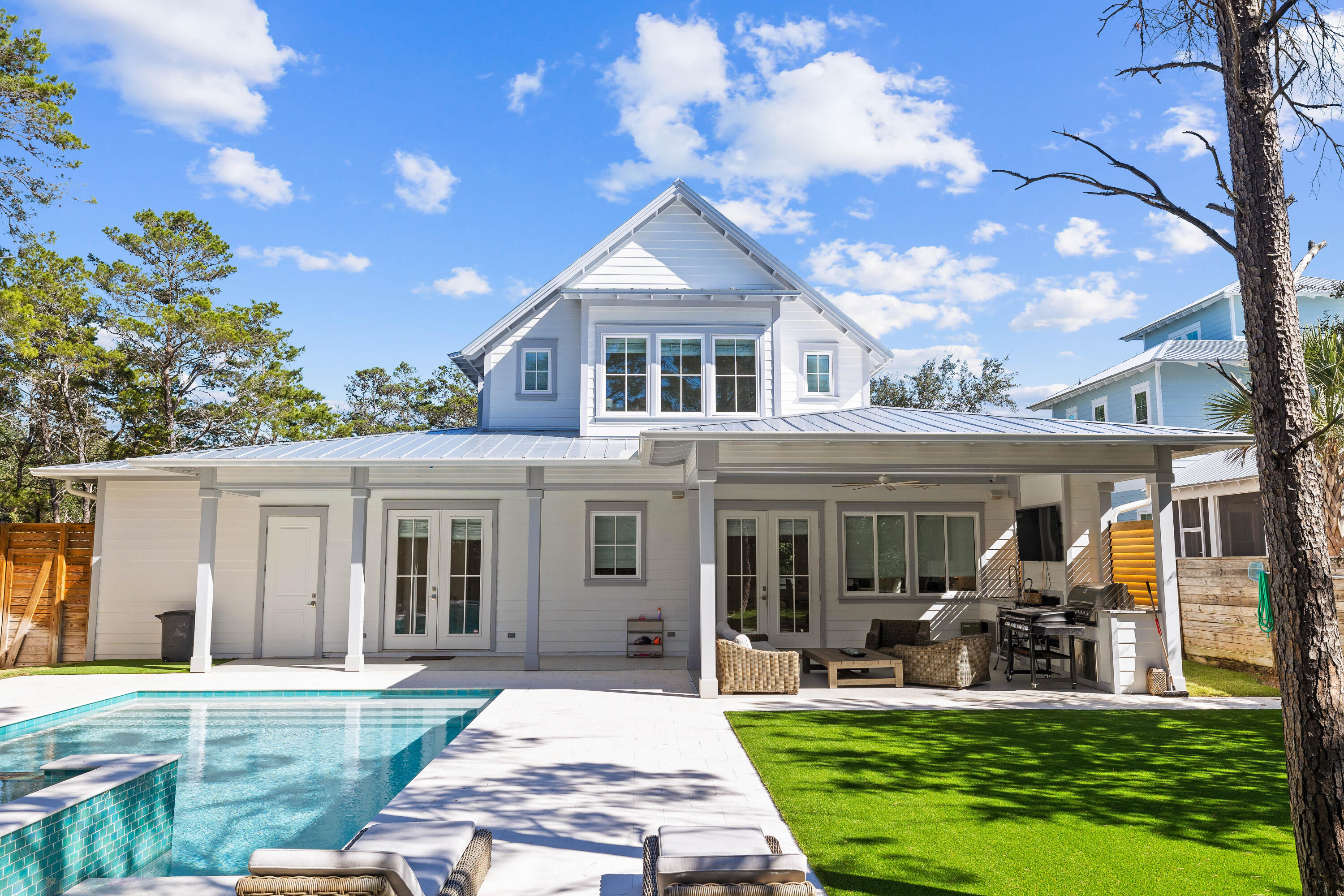 Custom construction completed in 2022, this home is handcrafted with luxury appointments meant to foster family memories. This amply sized three-bedroom, three and a half bath residence boasts exquisite design and luxurious features that will captivate the discerning buyer. Located only one mile from Alys Beach, the privacy and spacious lot create a haven of serenity while still being within a short walk or bike ride to world class shopping, dining, and entertainment. This property also has deeded beach access at the end of the street - a valuable commodity for those who don't want to compete for the limited beach frontage at larger subdivisions or public accesses.  This home greets you with a spacious open floor plan that's highlighted by the 10' ceiling height and