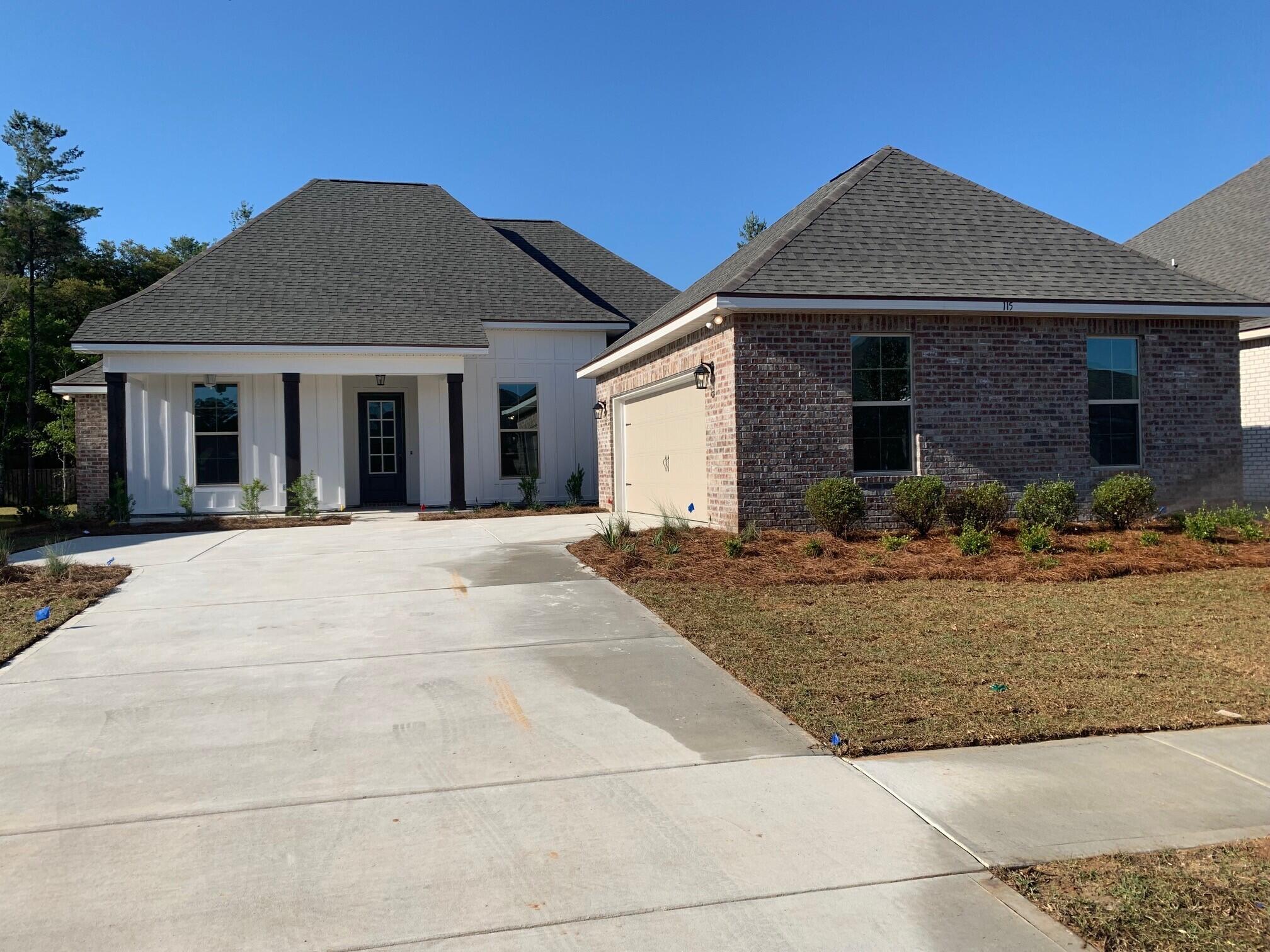 The RENOIR IV I in The Trails at Hammock Bay community offers a 4 bedroom, 3 full bathroom design with a flex space and a separate breakfast area. Upgrades added (list attached).Special Features: double vanity, garden tub, separate custom tiled shower, and walk-in closet in master bath, double vanity in 2nd bath, walk-in closets in all bedrooms, kitchen island, walk-in pantry, boot bench and drop zone in mud room, covered porch and patio, recessed lights, undermount sinks, cabinet hardware throughout, bronze plumbing fixtures, framed mirrors, smoke and carbon monoxide detectors, landscaping, architectural 30-year shingles, and more!Energy Efficient Features: tankless gas water heater, kitchen appliance package with a gas range, low E MI windows, and more!