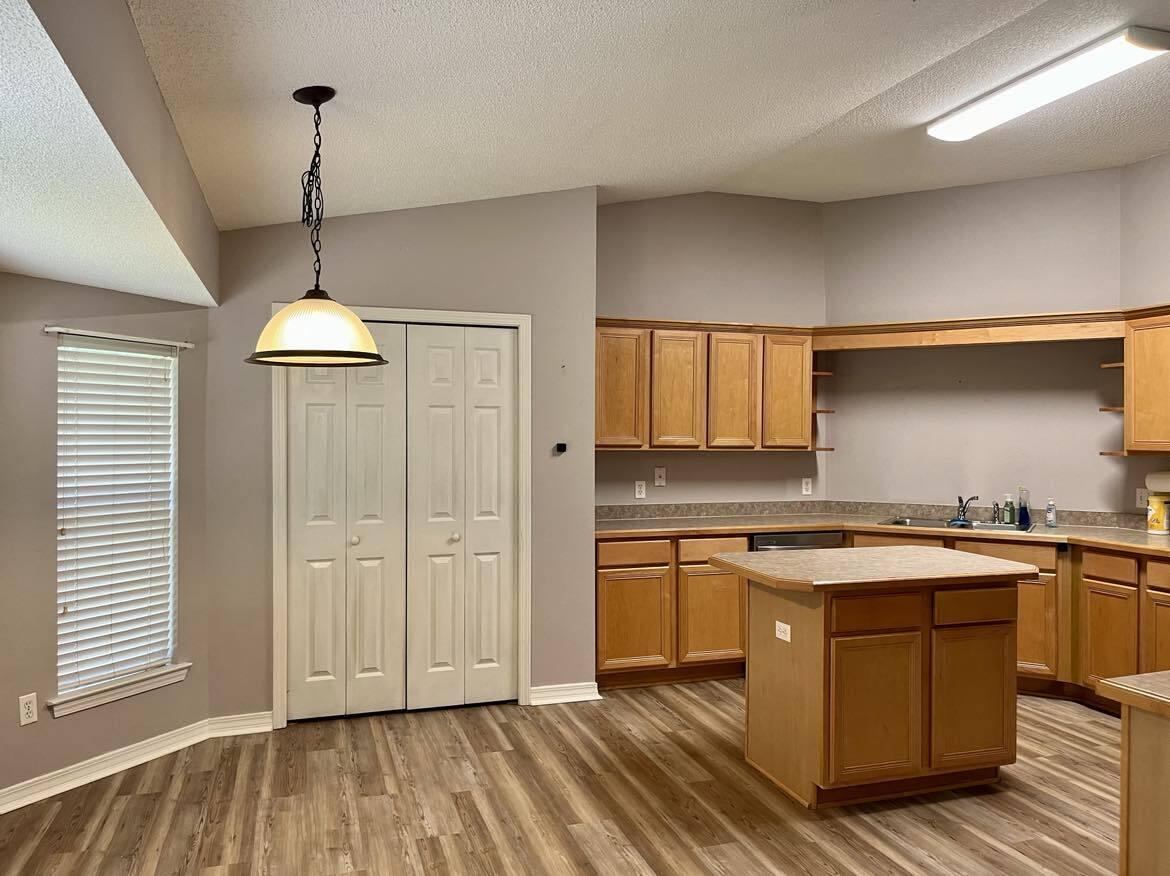 WOODMONT ESTATES AT HOLLEY BY THE SEA - Residential Lease