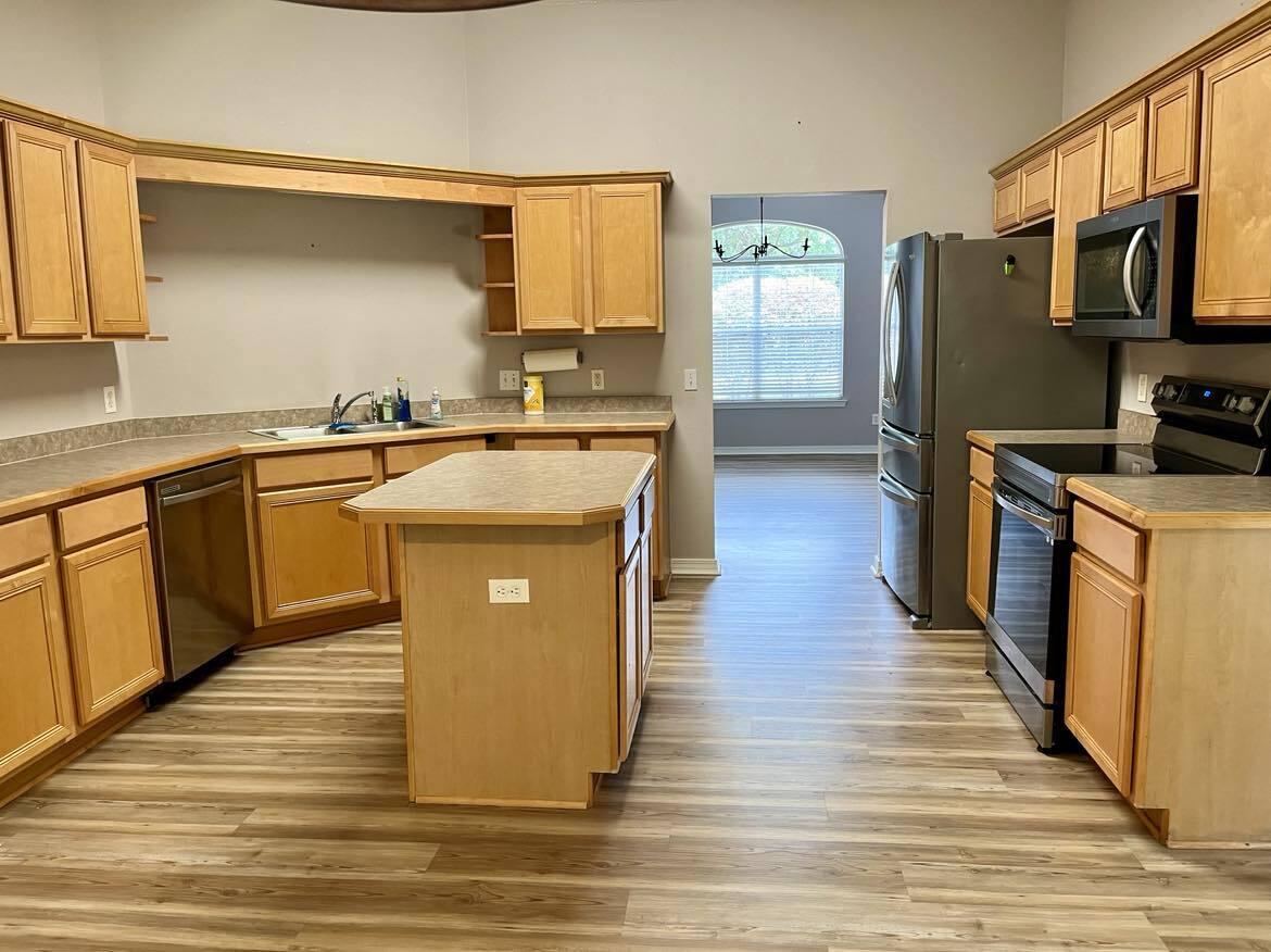 WOODMONT ESTATES AT HOLLEY BY THE SEA - Residential Lease