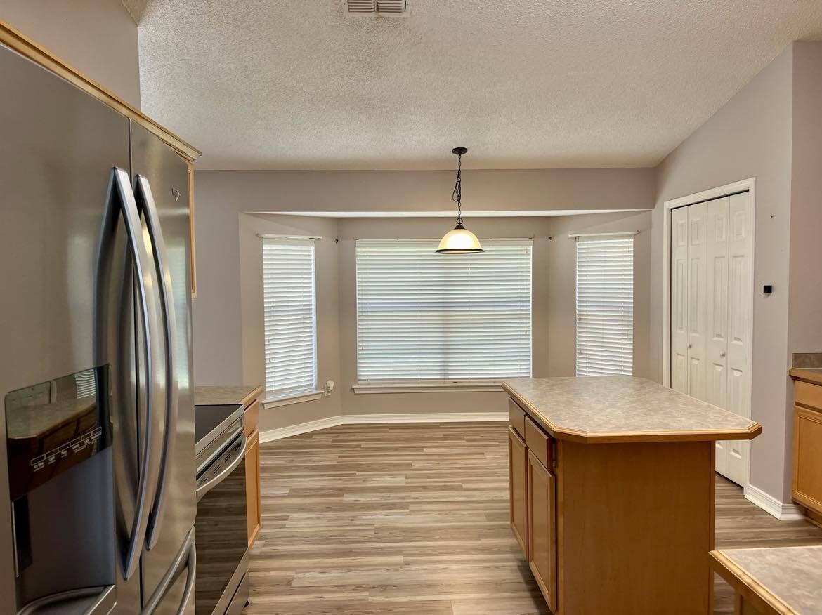 WOODMONT ESTATES AT HOLLEY BY THE SEA - Residential Lease