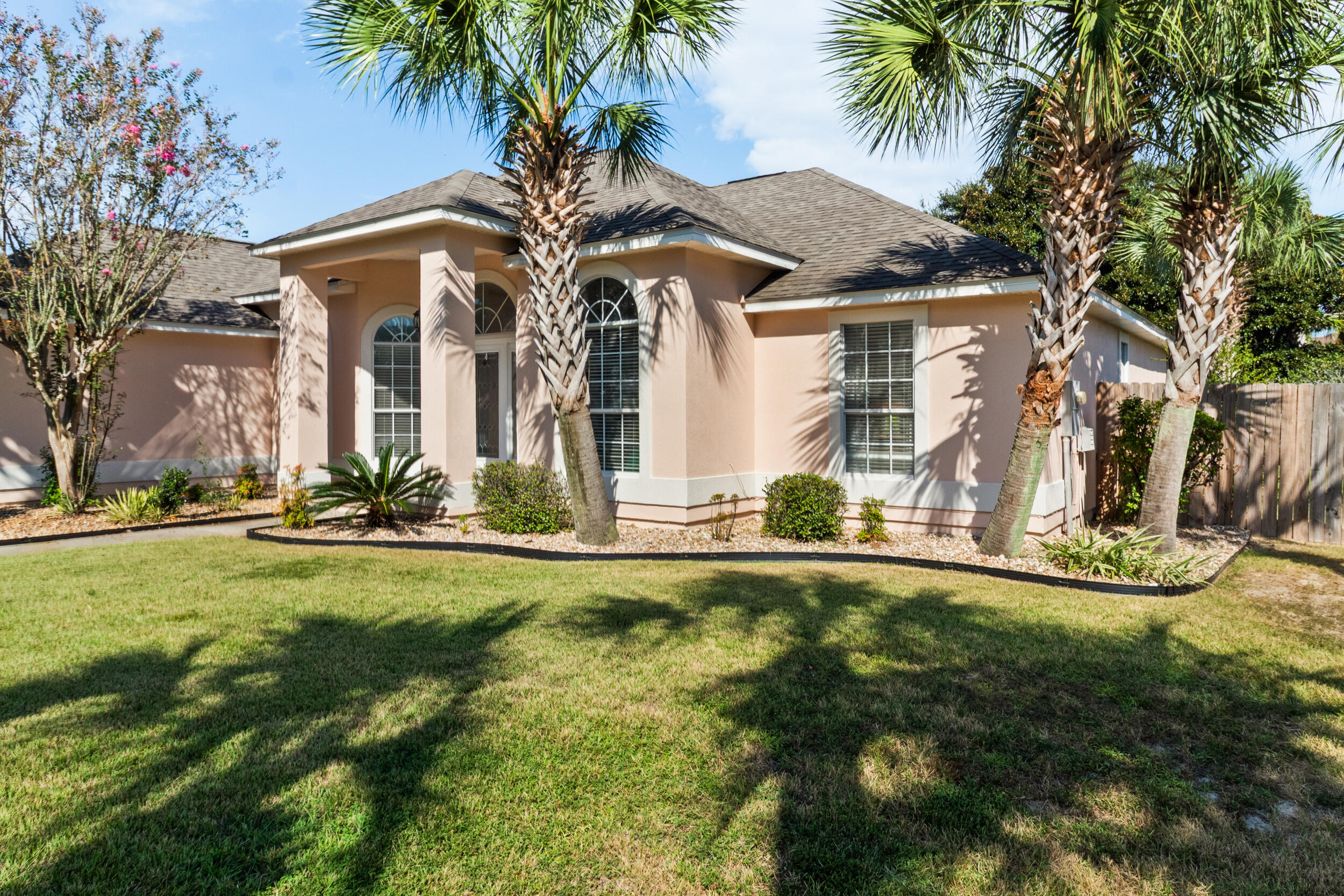 Just 120 Steps to the Sound! Experience all the benefits of waterfront living without the price tag! This spacious 3 bedroom, 2 bath home in sunny Navarre, Florida offers deeded access running right from your backyard to the sound. Imagine starting your mornings with breathtaking sunrises and ending your evenings with stunning sunsets from a small private beach and gazebo just steps away. Inside, you'll find a bright, open layout with thoughtful updates, including: New roof (2018), Cedar ceiling on the porch - perfect for relaxing outdoors. Updated counters, sinks, and cabinetsNew landscaping for fresh curb appeal.Freshly painted inside and out. Privacy fence with gate that opens to the sound access. A Beautifully tiled shower (2022). All this plus Navarre's famous white sand beaches and crystal-clear waters just minutes away. Whether you're looking for a family retreat or your forever home, this property is the perfect blend of comfort, charm, and coastal lifestyle. Don't miss your chance to "Just Live the Dream" along the Emerald Coast