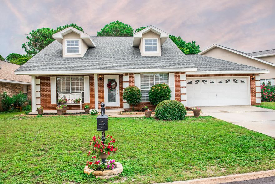 Best priced home in the desirable gated community of Emerald Lakes! This 1836 square foot 3 bedroom 2 bath brick rancher offers a great floor plan. The master suite is the entire upstairs with huge walk in closet, large master bath including a walk-in shower and double vanities. Two bedrooms downstairs with open kitchen and living areas. The Living room offers cathedral ceilings and fireplace. Fenced in backyard with patio that backs up to large green space. 2 car garage with pull down stairs. This gated neighborhood offers a community pool, walking paths, many lakes, a play area, and lighted basketball courts and tennis courts.5 minutes from the beaches of Destin, shopping, restaurants and more. This home is a must see and at just $141 per square foot it will not stay on the market long