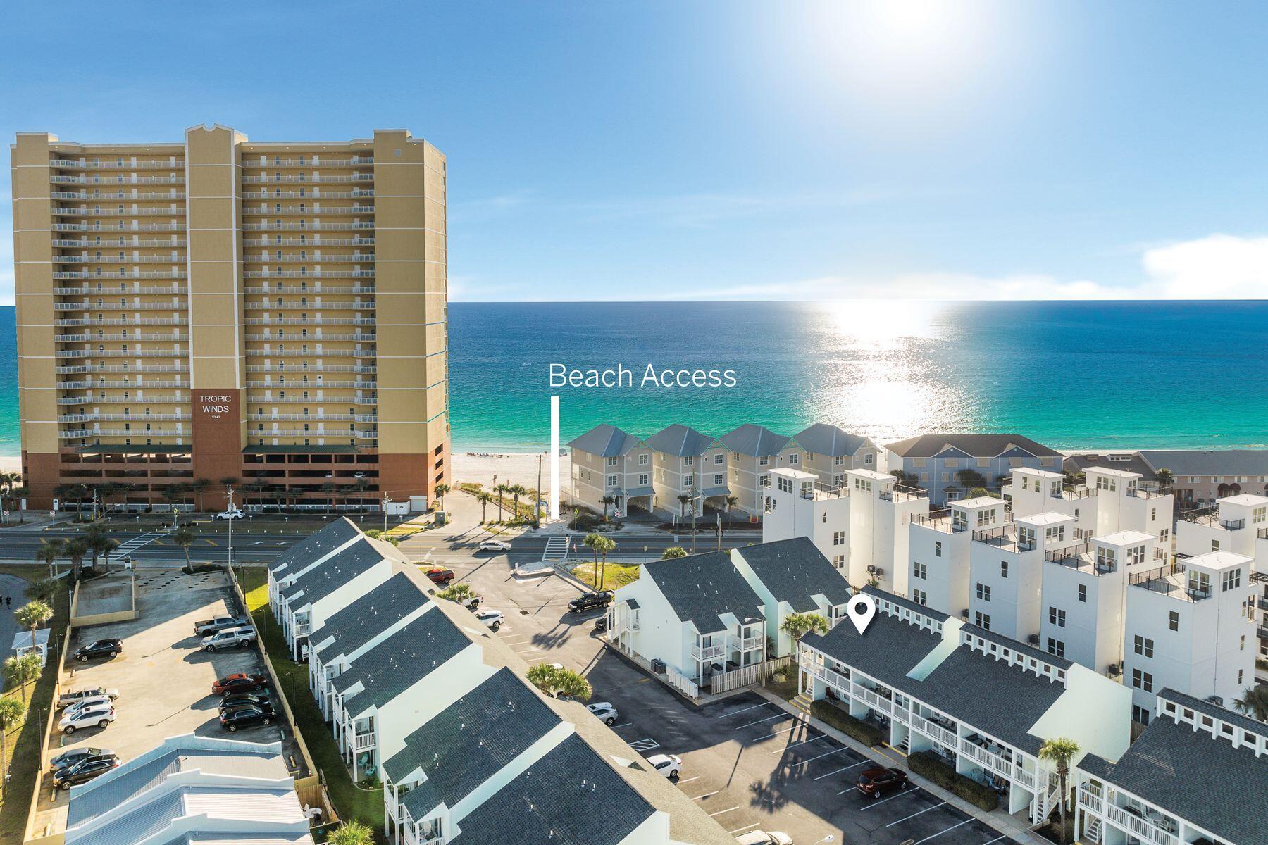 Experience the ultimate Gulf Coast retreat with this beautifully designed loft-style condo in Panama City Beach. Located in the sought-after Southwind community, this property combines modern comfort with coastal charm, making it an excellent choice for a second home or investment. The living room boasts vaulted ceilings, tasteful furnishings, and an abundance of natural light, creating a warm and inviting atmosphere. The modern kitchen, fully equipped for all your culinary needs, flows seamlessly into the living area. The master bedroom features its own private balcony, an ideal spot to unwind and enjoy stunning sunsets. Sold fully furnished, this condo is ready for you to move in or start generating rental income immediately.