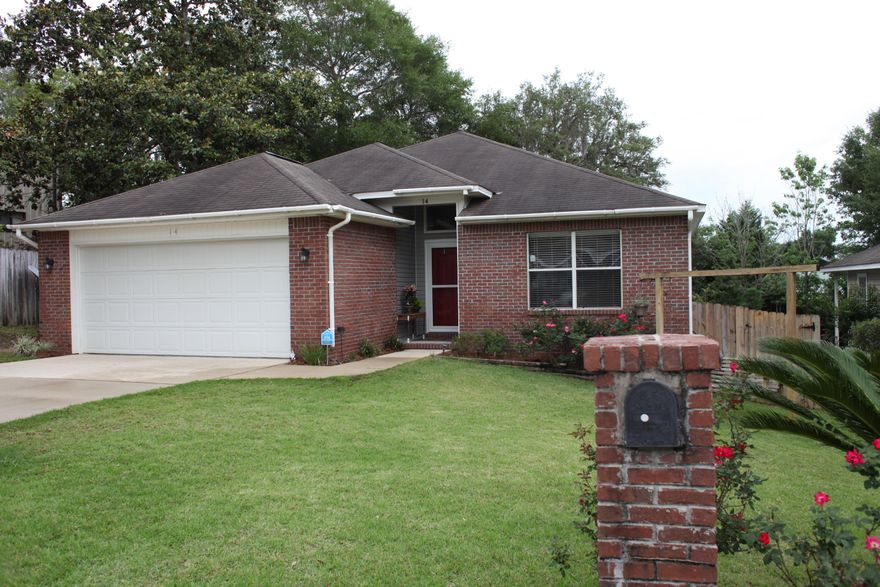 Beautifully updated 3 bedroom 2 bath home that has been meticulously maintained. Located at the end of a cul-de-sac this is the perfect place to call home! You are welcomed by vaulted ceilings as you enter the great room that has beautiful wood laminate flooring and recessed lighting. The kitchen is off of the great room and features beautiful oak cabinets, hard surface counter tops, stainless steel appliances, a breakfast bar and recessed lighting. The spacious dining area is just off of the kitchen and opens up to a fabulous deck leading to the back yard. You will see that this is the perfect home for entertaining. Split bedroom floor plan with Master on one side and 2 additional bedrooms on the other with guest bath in between. All bedrooms feature wood laminate flooring.