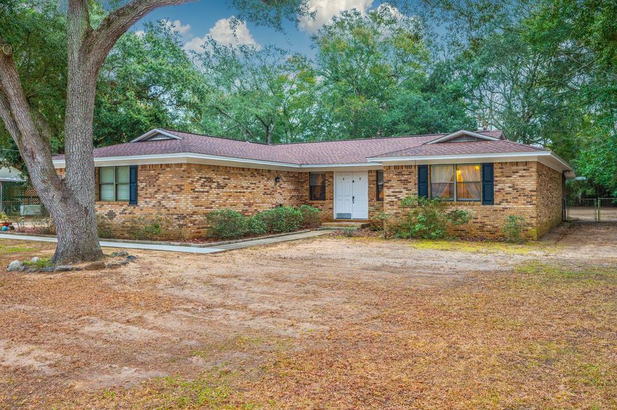 Milton, FL | Oversized 128x180 Lot | Upgrades Galore! This meticulously maintained home is packed with updates! Enjoy peace of mind with a NEW 2022 roof & hot water tank 2024. The remodeled 2021 kitchen features a stainless steel refrigerator, range hood & dishwasher, while the 2022 primary suite refresh boasts new flooring, vanity & a stunning walk-in shower. Sitting on an oversized 128x180 lot, there's plenty of space to enjoy! Conveniently located near Pensacola's gorgeous beaches & military installations. Don't miss this gem--schedule your showing today! #MiltonFL #DreamHome #MoveInReady