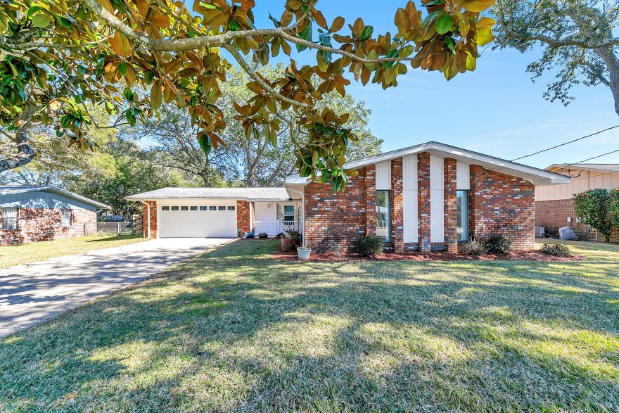 FANTASTIC, RENOVATED HOME IN GREAT NEIGHBORHOOD. Beautifully renovated kitchen, bathrooms, NEW interior doors & NEW LVP flooring throughout take center stage. Offering a spacious family rm w/fireplace adjoining the kitchen AND a 2nd separate large living area, there'e plenty of space to accommodate a busy lifestyle. Sleek white appliances & gorgeous granite counters w/large eating bar accent the open kitchen. Relax & unwind in your Beautiful remodeled master bath w/large walk-in shower.  3 yr HVAC, 3 yr HWH, pex plumbing & 7 yr Roof provide affordable insurance & piece of mind. Other features include recessed lighting, custom interior shutters & new garage door. Spacious 432 SF patio allows you to enjoy the Fl  lifestyle & large private backyard w/custom woven fence provides plenty