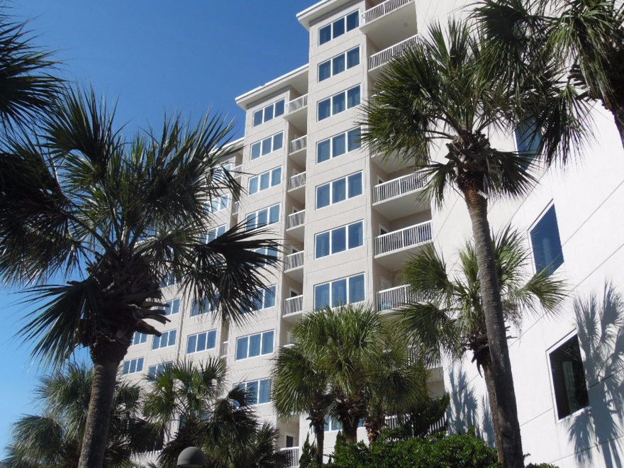 What a fantastic location for this 2 bedroom, 2 bath first floor handicapped accessible REO condo in the Summit building at Tops'l Resort! The condo features a bright an open floor plan with fantastic high ceilings, carpeted and tile floors and a sliding glass door to the patio with easy access to the pool, beach and all the amenities of Tops'l. The community offers, beach access, swimming pools, 14 Rubico Clay tennis courts, a state of the art workout center, and onsite bar and restaurant!