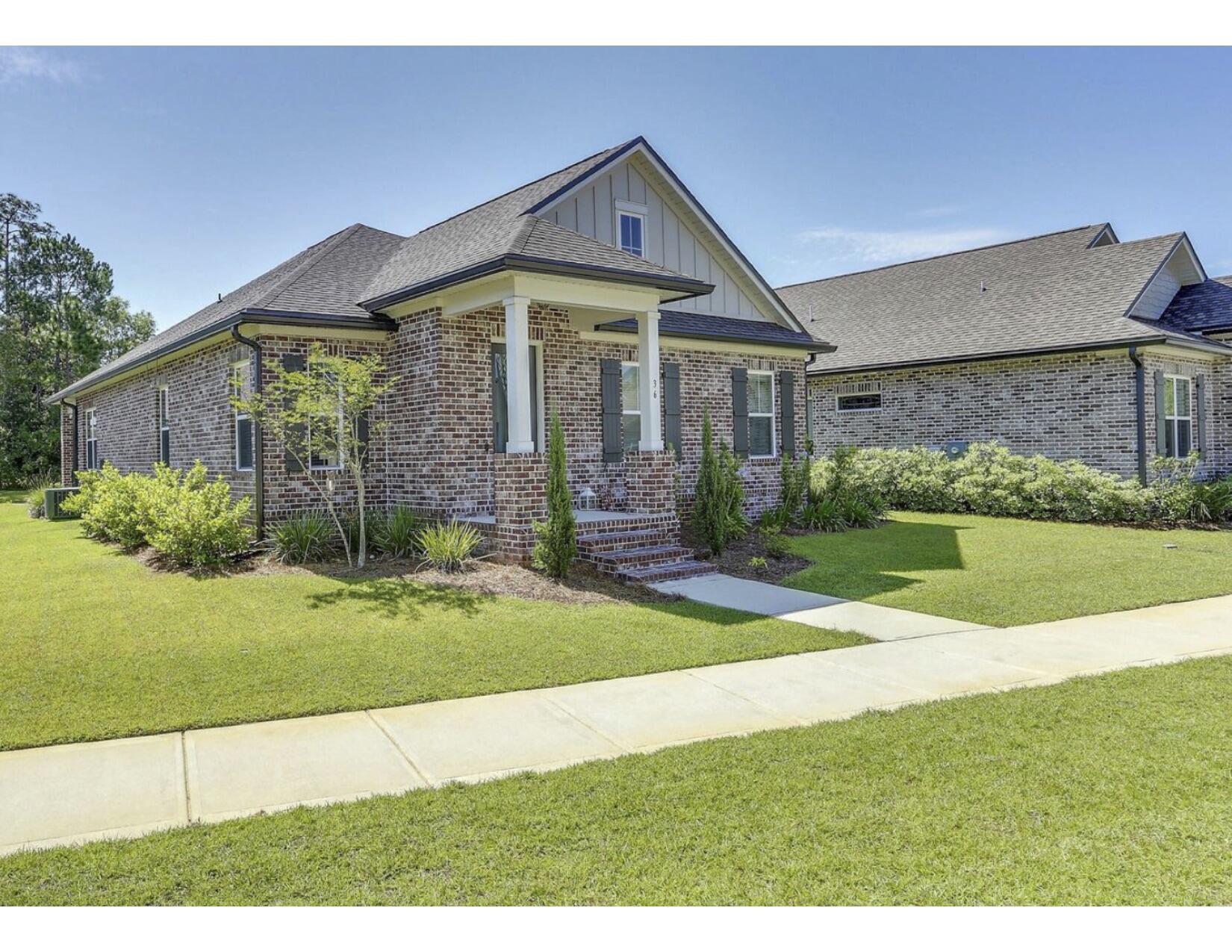 Charming home within walking distance to full service deep water public marina. This home built by one of the areas most respected builders, Randy Wise Homes and is filled with must have features. Craftsman style architecture, brick exterior, wood floors, crown moulding and base moulding, cased windows, 9' ceilings. Woodharbor, furniture grade cabinets, granite counter tops. Tile in all bathrooms. Large kitchen with stainless appliances. For the buyer who is looking for quick access to the water and a great value this is a must see!!