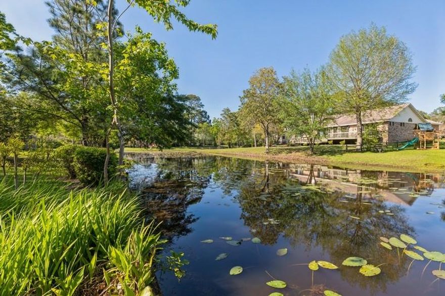 POOL HOUSE - NO HOA SHOWING WILL BEGIN AT OPEN HOUSE THIS SUNDAY 04/25 FROM 12PM-4PM.This is your dream home. Come see and enjoy the tranquility of this lovely unique home. This property has a screened inground solar heated pool with a waterfall and outdoor shower. You can enjoy the views from any level of this home. Sit right outside from the owners suite balcony and watch the beauty of nature with the 1.5 acre lake just 79 feet away from the home while listening to the sounds of the waterfall. The walk-out basement flooring was recently upgraded to luxury vinyl plank flooring and it is 100% water proof. Through out the rest of the home you will love the wide plank pine floors. These floor give the home such an amazing appeal. There is a central vacuum system through out entire home.