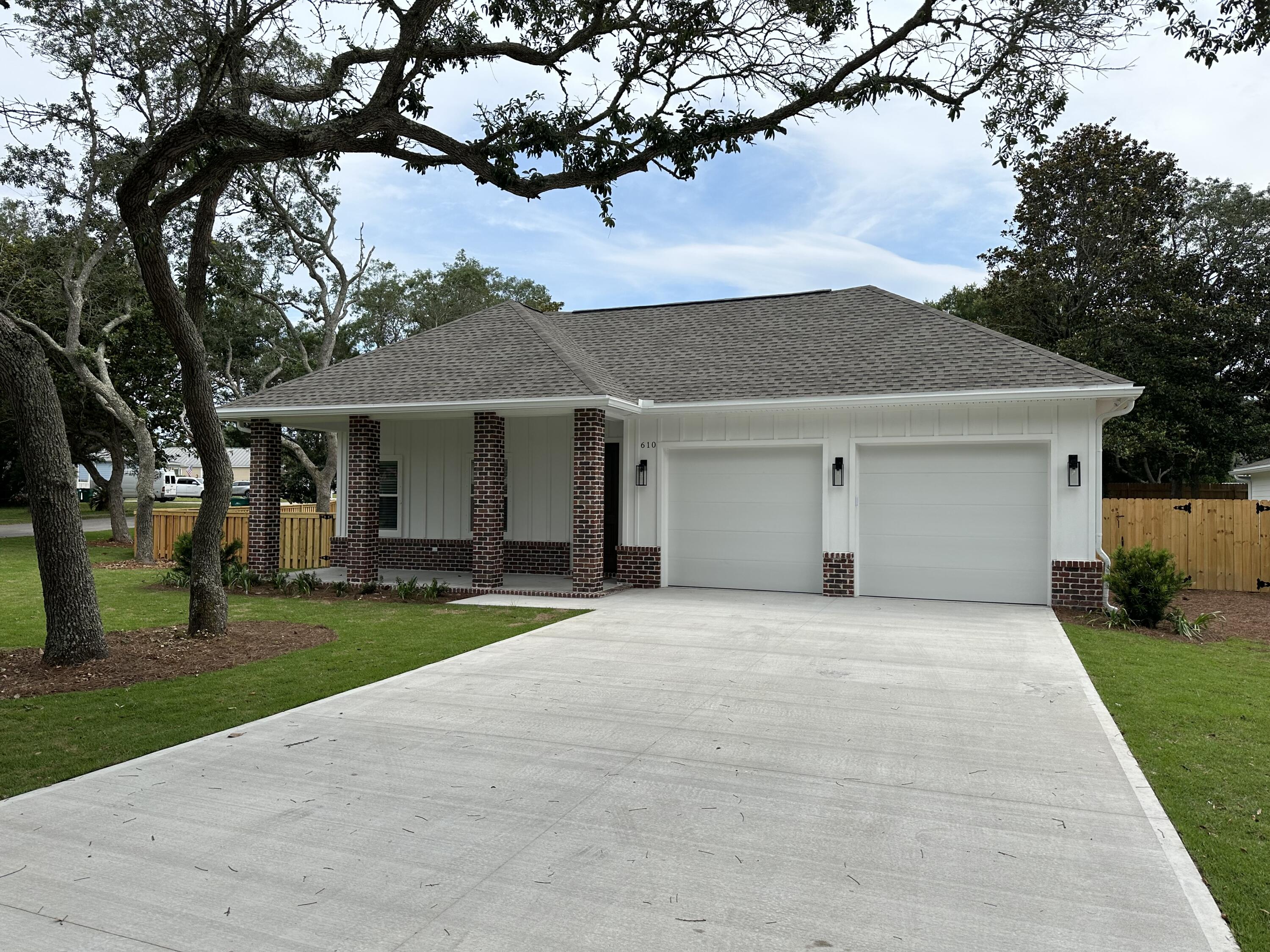 This beautiful new home features 4 bedrooms, 3 bath has all the boxes checked! Be the first to rent out this rare find. No carpet in this home, luxury vinyl plank flooring throughout, stainless steel appliances, granite countertops and window treatments, just to name a few. The kitchen is open and airy and overlooks the living room and beautiful back yard, which makes for perfect for entertaining. The substantial master bedroom, with a large walk in closet and a master bath that features a double vanity, a garden tub, a walk-in shower and a separate water closet. The guest bedrooms and baths are spacious. A new washer and dryer are included as well as a 2-car garage that features a car charger for those that have an electric vehicle.