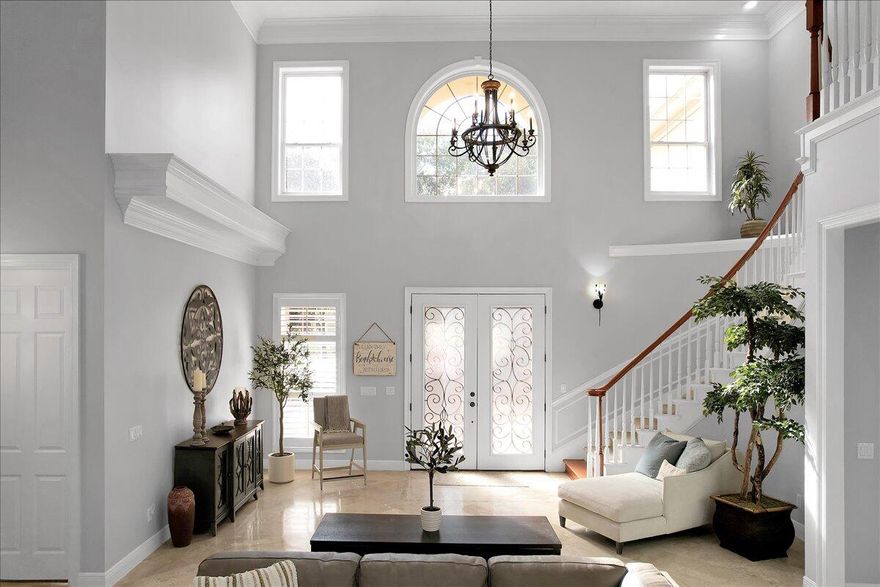 MOTIVATED SELLER!!  Welcome to your coastal paradise at 490 Regatta Bay Boulevard in beautiful Destin! This exquisite estate features 4,000+ square feet of living space including 4-bedrooms, 4.5-bathrooms in a style that exudes Southern charm and modern luxury, offering the ideal blend of elegance and comfort.Park your vehicles in the oversized 2 car garage and come on in to your new home.Inside you'll discover an open and airy living space featuring a dramatic staircase, 20' ft. ceilings, and large windows that flood the rooms with natural light. This house features honed travertine downstairs and pristine acacia hardwood flooring upstairs. The spacious kitchen is a gourmet's dream, complete with top-of-the-line appliances, granite countertops, and an island that's perfect for both meal preparation and casual gatherings. The whole house has been outfitted with custom wooden plantation shutters and meticulously maintained by the current owners.

The master suite is a sanctuary of relaxation, boasting a large steam shower, his and hers vanities, and a generously sized walk-in closet. This house features a 2nd master suite upstairs with a custom walk in closet, a bidet, a soaking tub and a walk in shower. The 4th bedroom could be turned into a large gym, media room, or mother-in-law suite, complete with a wet bar. There is also a bonus room currently used as a sitting area.

Outside, the expansive patio and lush landscaping create a private oasis for outdoor entertaining and relaxation positioned just along the 10th hole of the Regatta Bay Golf Course. Enjoy sunset cocktails on the covered porch or dine alfresco in the beautifully landscaped backyard while listening to the waterfalls flowing into the pool.

This elegant estate is part of the gated Regatta Bay community, known for its world-class golf, tennis, and easy access to the Gulf of Mexico's pristine white sand beaches. This home is the epitome of luxury living in a sought-after coastal destination.

Some recent updates include a new 7' refrigerator and gas cooktop, granite throughout with new sinks/faucets, new hvac, solid acacia hardwood flooring, closet and door added to 4th bedroom, new downstairs bathroom vanity/sink, new tile floor upstairs. 

Don't miss the opportunity to make this stunning property your forever home. Schedule a tour today and experience the beauty and comfort of 490 Regatta Bay Boulevard for yourself.

