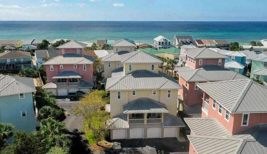 Property back on the market due to no fault of the property. CLOSE TO THE BEACH WITH GREAT GULF VIEWS! This beautiful 4-story townhome is located directly across the street from the emerald green waters and sugar white sands in the gated Casa Del Mar subdivision on Panama City Beach's popular west-end. Conveniently located near shopping, dining, entertainment, just 15 min from Pier Park, 5 min to Rosemary Beach and 30A. This 3BR/3.5BA townhouse sleeps 9. Features include a 2-car garage, private elevator, a loft on the 4th floor with outstanding Gulf views, three balconies and a covered patio. The town home comes nicely furnished and would make a great full-time retreat or a wonderful second home. One bedroom and a private full bath are located on the first floor.