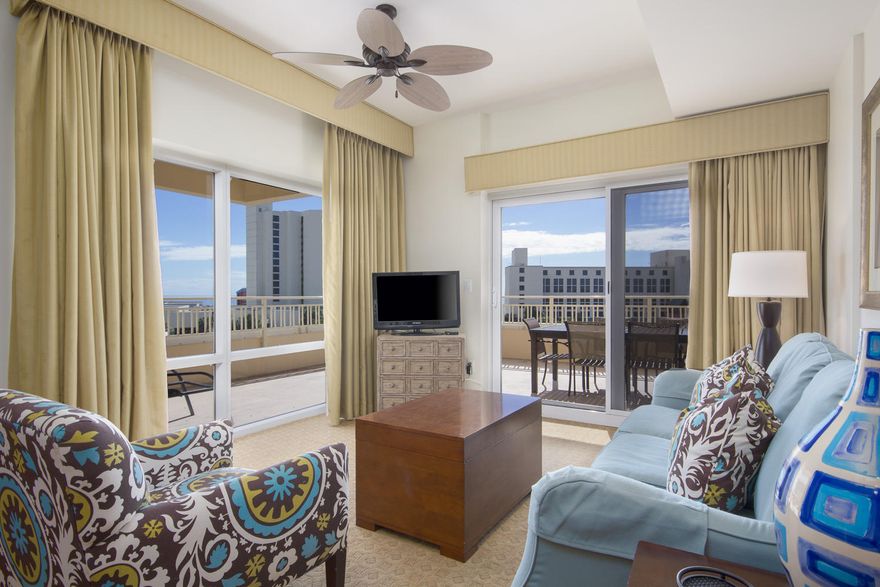 Relax and unwind in this Luau condo with its serene and tranquil decor, featuring updated furnishings and flat screen TV's. Views of the Gulf of Mexico can be enjoyed from the spacious wrap-around, over-sized terrace. The lock-off floor plan allows you to utilize it as a 2 bedroom, or 1 bedroom and a studio to increase your rental opportunities. Luau offers exceptional amenities for you and your guests to enjoy; such as a lagoon style pool with a swim under waterfall, a fitness center, outdoor gas grills, and easy beach access.