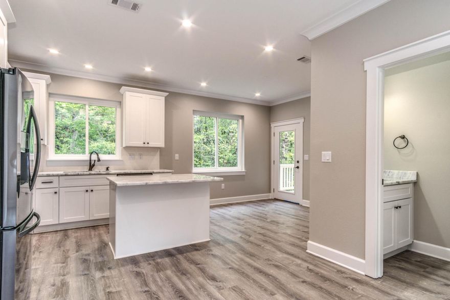 NEW CONSTRUCTION - This Veteran Owned General Contracting Company proudly presents a premier brand-new construction 3 bedroom, 2.5 bath home located on a quiet cul-de-sac in the heart of Niceville, FL. Centrally located near top rated schools, shopping, banking, & dining. Just minutes from the white sandy beaches of the Emerald Coast as well as Eglin AFB. This 2 story home featuring hardiplank sliding sits on a high & dry lot with a view of a beautiful creek and a wetland preserve from your back deck. A well thought out floor plan with slate stainless appliance, premium tile showers, quartzite granite countertops, custom cabinetry in the kitchen, all bathrooms, & the upstairs laundry room. Call the listing agent for more details. A MUST SEE.