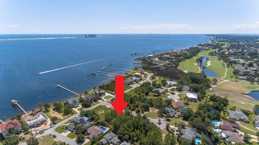 This is a great lot on which to build your Dream Home! Located on a quiet cul-de-sac, the Santa Rosa Sound waterway and Soundside Foundation Nature Preserve are just steps away. Shopping includes Lowe's, Publix, Starbucks, Walmart and many restaurants - all within 1 mile. Pensacola Beach is just 10 miles to the West and Navarre Beach 14 miles to the East. A public boat launch and Tiger Point Golf Club are just around the corner.