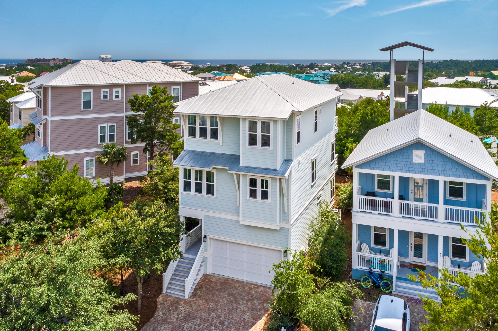 GULF VIEWS! A Highland Parks home that is truly distinctive, 276 Gulfview Circle is the ideal coastal residence for today's discerning buyer. Encompassing more than 3,100 square feet across three levels of expansive living space, this home epitomizes the ease and simplicity so synonymous with the 30A lifestyle.Highly coveted features such as a 2-car garage, gulf views from the third-floor master suite and a home bordered by protected green space, on two sides, immediately set this home apart within this thriving community. Built in 2017, this home has had just one owner and has never been rented, used exclusively as a second residence for the sellers. It provides an extraordinary opportunity to own a beautifully maintained and carefully kept home in the heart of