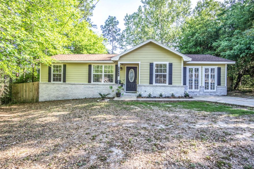 Don't miss this fully redesigned 3/2 home conveniently located within walking distance to elementary school! Roof, HVAC and Septic are all updated! New Hardie board siding with white-wash brick gives an insurance discount! Inside boasts decorative tile flooring, shiplap wall coverings & custom built-in cabinetery in main living area. Rustic industrial styled kitchen has shaker-style, soft-close, maple cabinetry & matching gas appliance package! Large master suite includes barn door styled closets, vessel sink vanity, wood-look tile flooring and a ceramic walk-in shower with dual waterfall shower heads. Located on a quiet street with serene lake views from your back yard. Workshop has electricity and double barn doors, perfect for a vehicle and your hobbies! Excellent valued property!