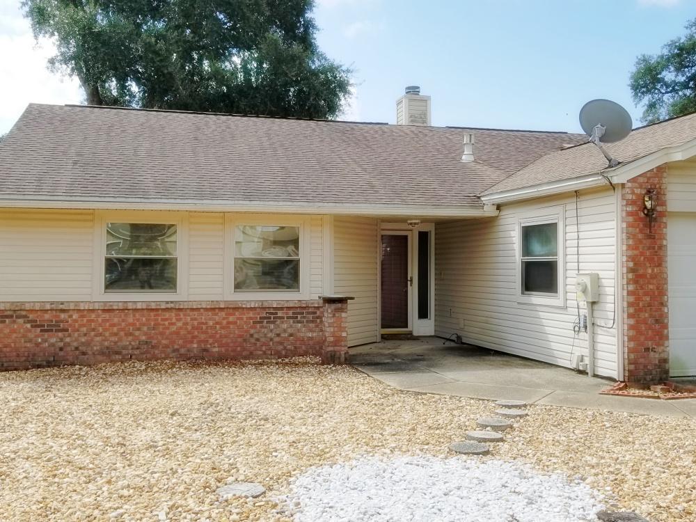 Very well maintained, 3 bedroom 2 bath home in Cedar Ridge. Super low maintenance xeriscaped front yard. Enclosed tiled Florida room overlooks the privacy fenced back yard. Morning coffee anyone? 3 sets of French doors exit into the back yard, vinyl windows, Gas stove/oven, Good sized master bedroom with a walk-in closet. There are also streetlights and underground utilities in this neighborhood! Close to public schools, college, shopping and the fabulous beaches of the Emerald Coast! Convenient commute to Eglin, Duke and Hurlburt.