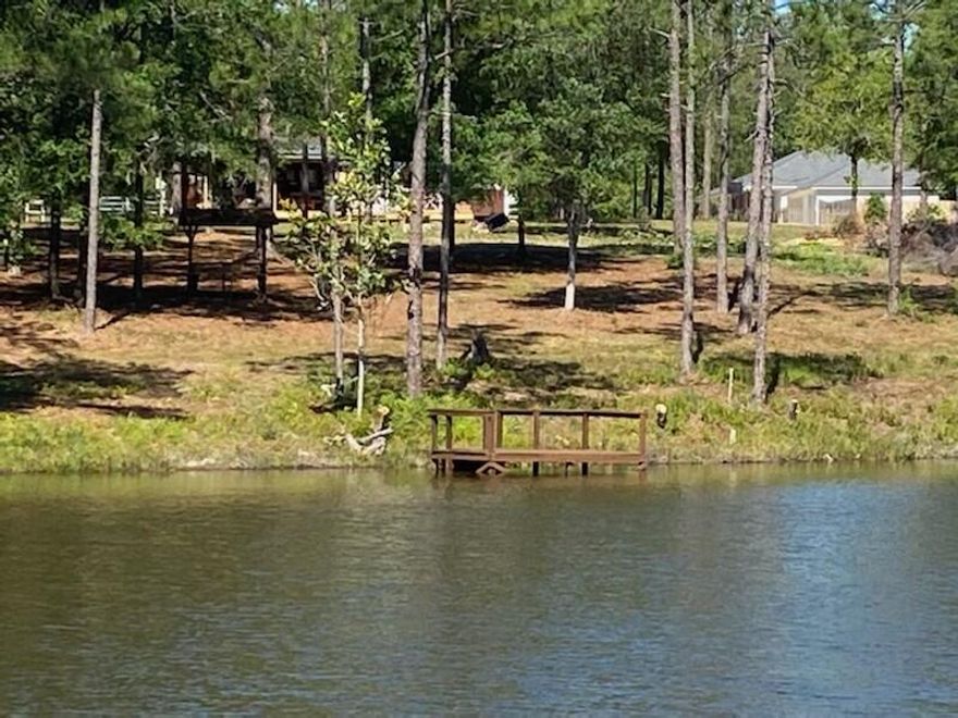 **LAKE FRONT PROPERTY**BACK ON MARKET DUE TO NO FAULT OF SELLEREnjoy the tranquility of the lake while also being close to the city. Lakefront property at an affordable price. The possibilities are great with level land to build upon as well as, this could be a fantastic rental property that's excellent for outdoor activities. The property already has a septic tank and an electrical pole on the property.The property has two sheds (His & Hers) that conveys with the property. The sheds have sleeping capabilities as well as a toilet and kitchen/breakfast area to ensure a comfortable stay. Come take a look soon this will not last long!!