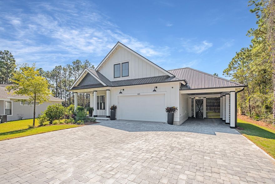 Beautifully designed and primely located on Golf Club Drive, this exceptional new construction retreat in Dune Allen Beach masterfully built by renowned Cogent builders offers idealistic beachside living. This coastal home yields a well appointed two-story design with spacious, ground floor living and ample space for entertaining. The main level is characterized by an expansive covered front porch, open living area - complete with a chef's kitchen, walk-in pantry and dining area, all adjacent to the pristine outdoor living. The primary suite offers a spa-like bathroom and direct access to the rear lanai. The ground floor has two additional bedrooms, along with a laundry room and attached two-car garage.