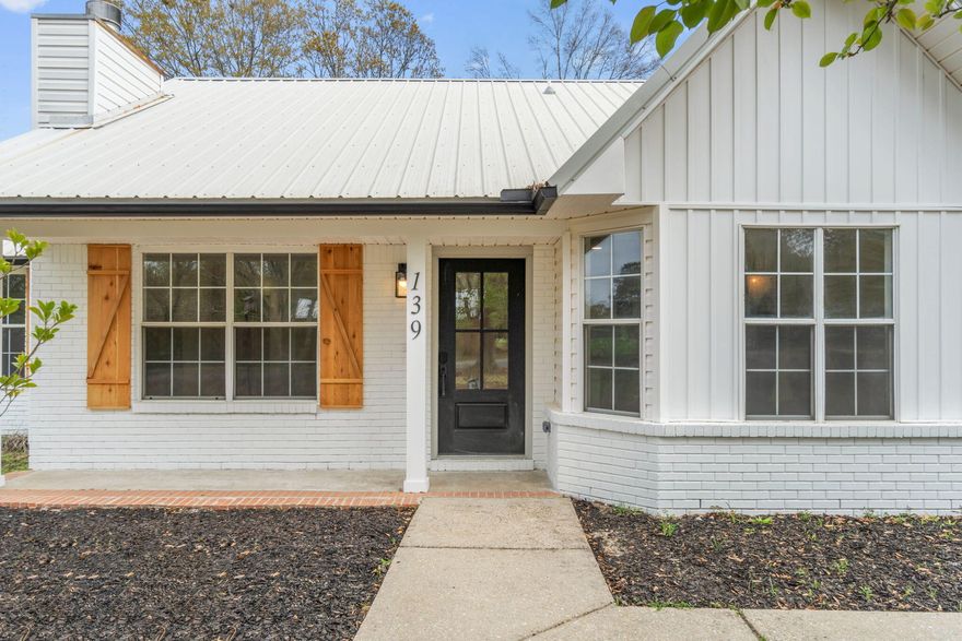 Welcome to your charming oasis located in Dogwood Estates in Crestview. This beautifully renovated residence offers a perfect blend of modern convenience and classic charm. Situated in a prime location, this residence boasts comfort in every corner.

Every detail of this 3 bedroom, 2 bathroom residence has been meticulously updated ensuring a fresh and inviting atmosphere throughout. Some notable features are LED recessed lights, fresh paint inside & out, custom light fixtures & fans, updated doors & trim work, custom kitchen, new carpet in bedrooms, and custom bathrooms. For added peace of mind, you'll find a new-ish metal roof and a brand new water heater for lower insurance premiums. You'll enjoy ample space for relaxation and entertainment in the bright and airy living room adorned with a cathedral ceiling, perfect for gatherings of any kind. When those cold nights come knocking, the cozy wood-burning fireplace will create a warm ambiance for all to appreciate. For the culinary artist, this custom kitchen is sure to impress. Equipped with stainless steel appliances, granite countertops, kitchen island and ample storage, making cooking a delight. Retreat to the elegant primary suite adorned with another cathedral ceiling featuring a spa-like ensuite bathroom and generous closet space. Additional bedrooms offer comfort and versatility for guests or family members.

Step outside to your private backyard to open possibilities with what you can create with this blank slate on 0.36 acres. Perfect for outdoor dining, gardening, a pool or simply unwinding after a long day. Conveniently located near schools, parks, shopping, and dining, this residence offers the best of Crestview living. This home is not just a residence, it's your paradise!