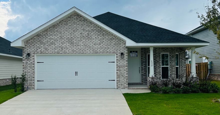 Limited-time offer: Receive up to $35,000 price discount on this home. Ask about our 3.99% interest rate buy down promotion with our preferred lender. Community also has USDA financing with zero down payment for those that qualify. Just a 20 minute drive to South Walton beaches!  Craftsman style, 3 BR/2 BA home with Hardiboard siding and brick skirt located on a cul-de-sac lot.  The interior features 9' ceilings throughout, and 10' trey ceilings in the Living Room and Master Bedroom.  Bay window delivers a sunny dining room. 8' entry doors, quartz countertops and durable CoreTec Pro Plus luxury vinyl plank flooring throughout.  Oversized owner's suite with large walk-in closet. *Some photos have been virtually staged to illustrate the home's potential.*