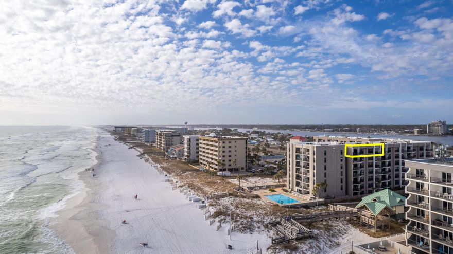 FOUR bedroom rental penthouse in Emerald Isle with stellar performance: $122K in 2023, $106K in 2024!! Unit 702 is fully updated and has two balconies, providing views of both the Gulf of America and the Intercoastal. This property can be the perfect primary residence, second home, or short term rental (AirBNB/VRBO). The kitchen offers modern stainless steel appliances, granite countertops, and white shaker-style cabinets. The same countertops and cabinet styles are used throughout all the bathrooms, which are also highlighted with floor-to-ceiling custom tilework and shampoo nooks. To make it even better, this unit comes with an assigned, covered parking space (only 15 of those on site!) and a storage cage. Don't forget to also check out the amenities, including the private... ...beach access, beachfront heated pool, BBQ area, tennis courts, laundry facility and more. You can purchase this condo knowing that Emerald Isle spent $4.2M on renovations, all state required inspections are complete, and all special assessments have been paid. HVAC is 2019 and Water Heater is 2021. Call today for a showing!
