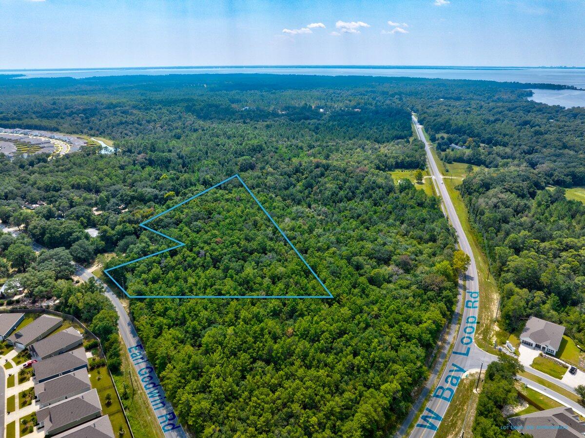 Prime 4.68 Acre Parcel with Incentives! Nestled in the heart of Freeport, FL discover this sprawling 4.68-acre gem on Earl Godwin Road just off the 83 A West Loop. A coveted location in the fastest growing city in Florida, offering convenience and accessibility. An easy commute leads west on FL 20 to Niceville, grants access to the famed beaches of 30A via 331, and a mere 20 minutes to Interstate 10. Unrestricted and ripe with potential, envision crafting your dream home and a guest house on this expansive canvas. Take advantage of price improvements and incentives, creating the ideal haven in this flourishing locale.