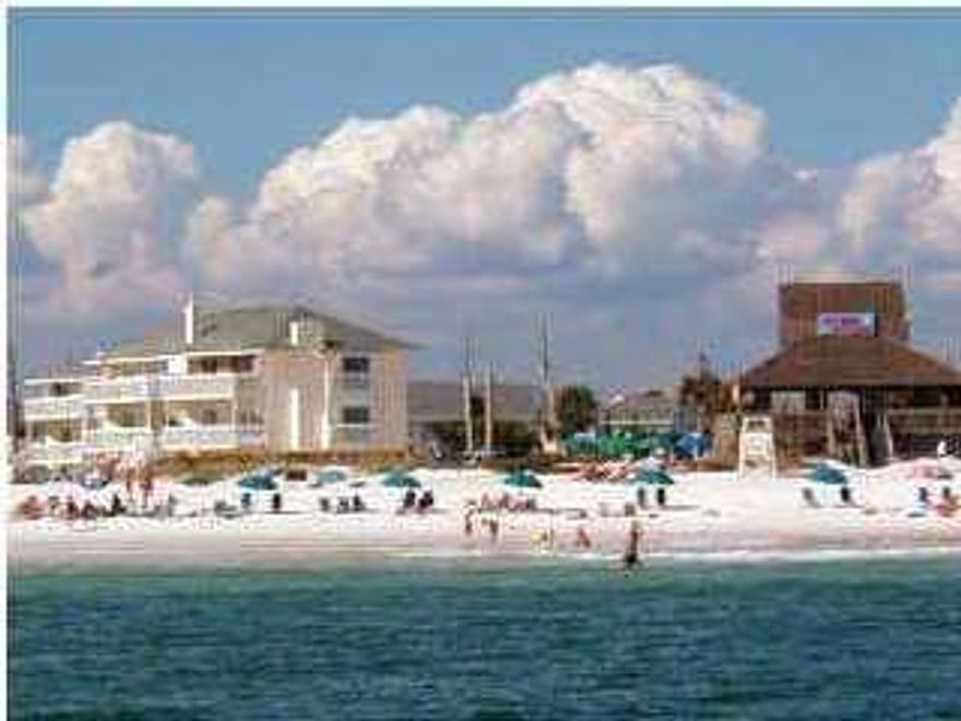 Well maintained, beautifully furnished, and centrally located near the beach. Great condo for investment (rental) or second home. Beautiful wood and tiles floors. SPC is a medium density, residential style resort occupying 43 acres in the heart of downtown Destin. Favorite amenities include 5 pools, six tennis courts, 1100 ft beachfront with seasonal beach service at Rick's Beach Bar and Grill, a Marina for long term docking (by lease/ availability, Canal boat docking for short term docking availability, and the popular 9 hole par 3 pitch and putt golf course. Buyer to verify footage and room sizes.