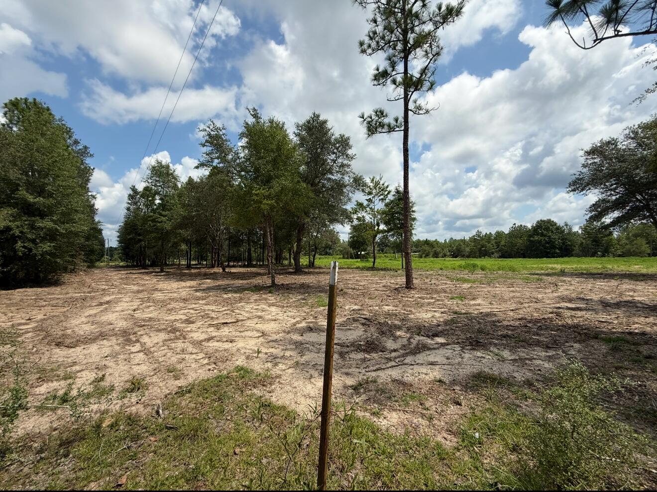 Rare Find - 5 Acres with Utilities!Don't miss this unique opportunity to own 5 beautiful acres of land, offering the ideal mix of open space and wooded privacy. Whether you're looking to build,, or simply invest, this property is partially cleared and partially wooded, giving you the flexibility to make it your own. Electric, Septic and well are on site. No HOA. No flood insurance required. Fencing is in place except for part of the front of the acreage. All that's missing is your vision for a custom home or investment retreat that embraces the peaceful private tranquility of this property.
Buyer will be responsible to complete due diligence to ensure accuracy of all information. This land is Vacant with utilities. Condition of existing Utilities are not know. Well, Septic, & Electric. Buyer will need to do due diligence.
