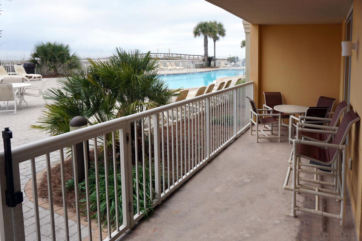Rental Machine- similar units grossing over $118K / year.  This unit has over $90k of bookings already in 2022 with several weeks still available to book.Direct Gulf front- walk out to the pool and beach from the spacious patio. The condo has recently been completely updated with new floors, kitchen cabinets and all new bathroom cabinets. Unit 103 is a 3 bedroom, 3 bath beach front condo. Azure has 2 large pools (1 heated), 2 hot tubs, a splash park and a fitness room. There's a nice lawn area right outside the patio gate. 103 has easy access to the 4-level parking garage and the gas bbq grills. Owner's pets are allowed. This is a terrific condo for families or income property.