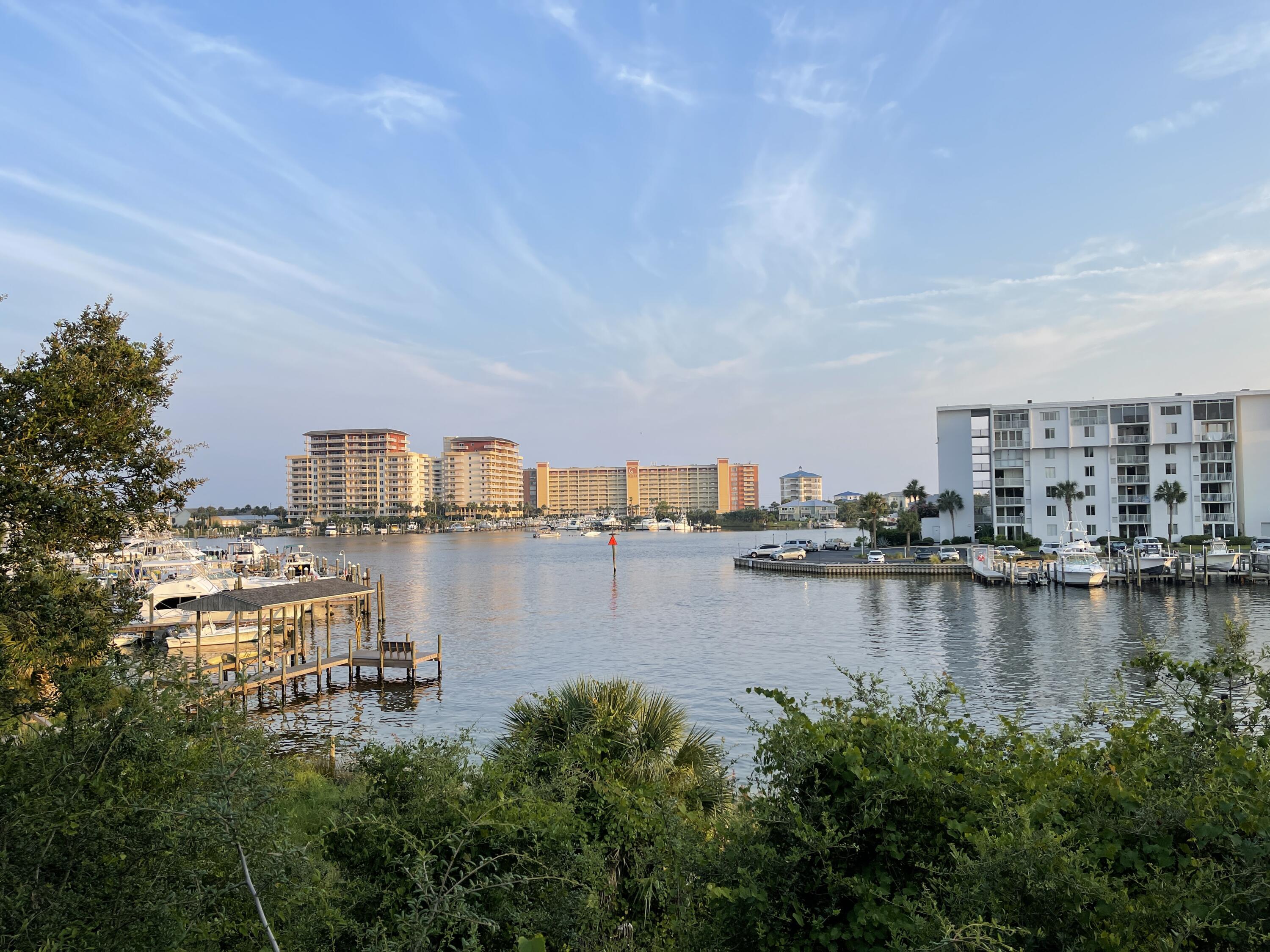 Build your dream home on 102' of gorgeous HARBOR WATERFRONT lots. Conveniently located in the heart of the Destin Harbor area at approximately 28 feet of elevation. High and dry with breath taking harbor views. These two adjacent vacant lots (6&7) are being sold together. Build one large or two smaller homes.Boat slips may be permitted and built.Single Family Residential Zoning. Residential neighbors on both sides of these lots.The two lot parcel ID #'s are 00-2S-22-0701-000M-0060 AND 00-2S-22-0701-000M-0070.Height restriction is 35 feet or 3 stories.No short or long term rental allowed.Please call today!Buyer to verify all information.