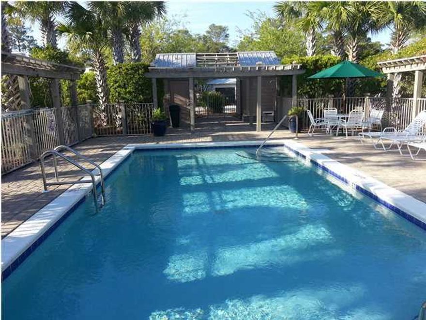 READY IN 60 DAYS. Summer Ridge is a private gated community of twelve homes. It is located just north of Hwy 30A close to Gulf Place and the Walline Park beach access. The home offers spacious living and entertaining areas and a gourmet kitchen with pro style stainless steel appliances and generous work surfaces. An adjoining partially covered deck overlooks the rear wooded yard. The second floor master bedroom suite has a private covered deck. Two additional bedrooms, each with a private bath, are located on the third level. The home features classic Florida cottage detailwith upgraded moldings, job finished hardwood flooring and upgraded carpet. The home also has an attached two car garage, entrance courtyard, and irrigated and landscaped yard.