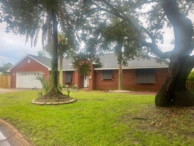 Make this beautiful 3 bedroom oasis your home today. It has an adjoining sunroom and sits on a cul-de-sac in Gulf Breeze. The Great room features Cathedral ceilings with skylights which make this home light and bright. The Large master bedroom has two walk in closets. Other features include double vanities and a garden tub in the Master Bath. The sunroom is perfect for a Florida evening. Contact Navarre Beach Realty at dawn@navarrebeachrealty.com, 850-936-0700 or come by the office at 8666 Navarre Parkway in the Winn Dixie Shopping Center.