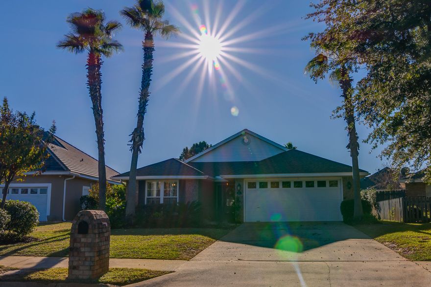 This home is situated in the Bayside neighborhood overlooking the lake. This home is warm and inviting with beautiful granite countertops, tile back splash, and stainless steel appliances. The solid walnut breakfast bar is great for casual kitchen eating and entertaining, and the large double door pantry provides plenty of storage space. The kitchen, breakfast area and den open to the covered 10' x 24' tiled patio overlooking the lake and water fountain. The open formal dining room and living room have vaulted ceilings and gas fireplace. A spacious and private master wing includes large bedroom, his and hers walk-in closets, master bath with large garden tub, separate shower, and double sink vanity. Home is well maintained and won't last long, it is beautiful and shows well.