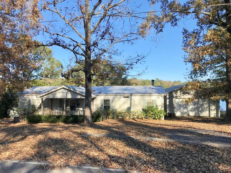 Best waterfront buy on King Lake! 1512 S.F. Homes of Merit manufactured home with an 800 S.F. work shop with commercial roll up door. Property being sold '' AS IS'' Cash offers only. Price reflects the fact that some minor repairs will be required to bring this waterfront home back to its pristine condition. King Lake is a trophy bass & bream fishing lake. Great location on the lake and an even better price!