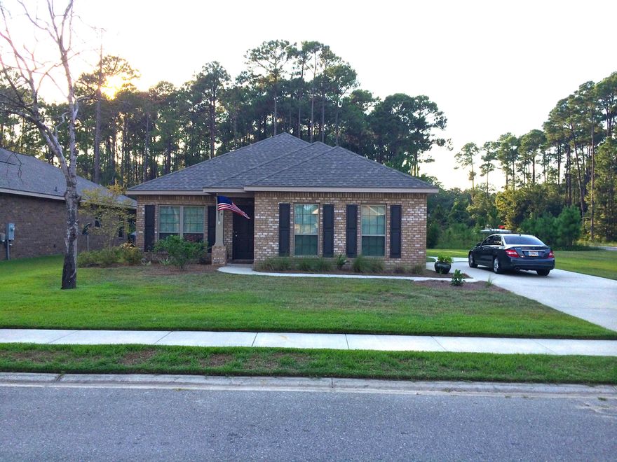 This like new brick ranch offers 1736 sq ft of well appointed living space. Stainless steel appliances, hardwood floors, covered porch, two car garage, granite countertops in kitchen and both bathrooms, tiled kitchen floor, separate dining room with large window, home security system, walk in closet in master bath, garden tub, walk in shower, and large corner lot all within walking distance to the community pool, bbq area, playground, and several catch and release fishing ponds. LR mantel and washer and dryer do not convey.