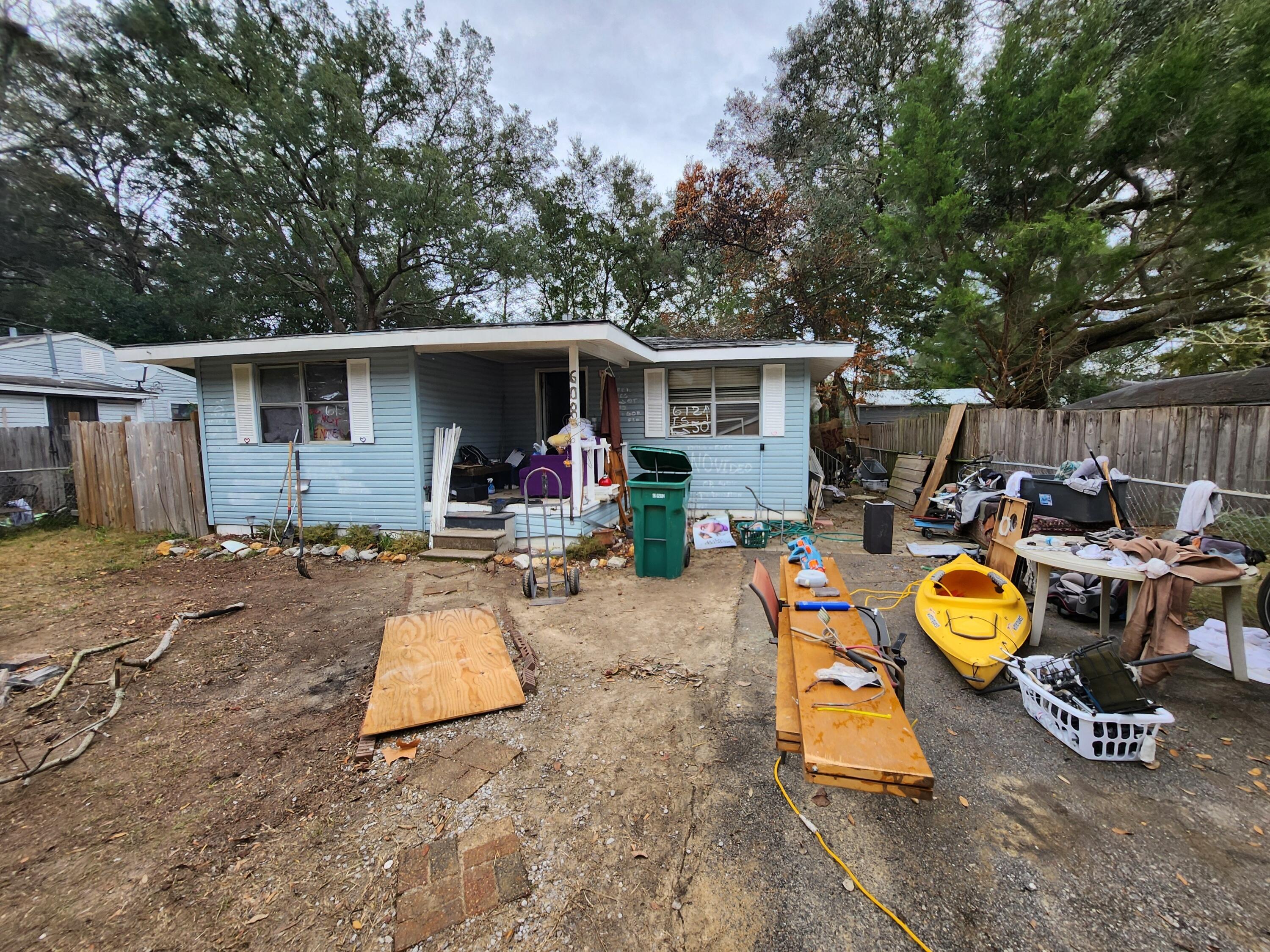 CALLING ALL INVESTORS. Distressed 2 bedroom 1 bath cottage style home for sale in desirable Niceville neighborhood on large central lot. This property recently had a fire and is distressed. Fix it up or tear it down and build fresh, its up to you. Cash only. Vacant and easy to show.
