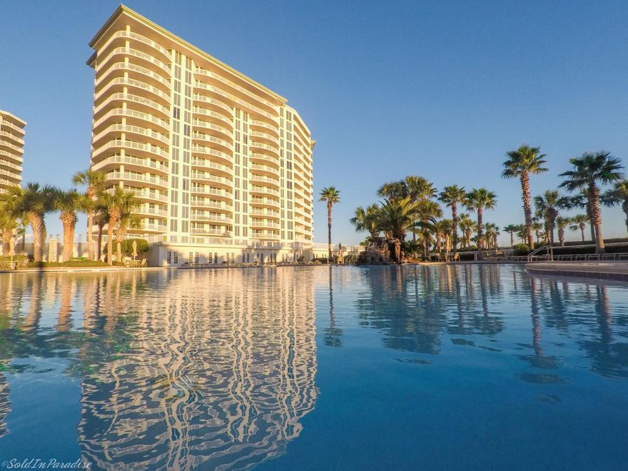 This 11th floor completley renovated condominium is simply spectacular. The open floor plan with a wall of floor to ceiling glass gives you amazing views of the sugar white sand and the emerald green waters of the Gulf. The large terrace provides privacy and is accessible from the living, dining and master bedroom. There is travertine flooring throughout the living, dining and master bedroom. The kitchen is one of a kind with custom cabinetry, stainless steel high-end appliances and marble counter tops. The gulf front master bedroom includes a huge custom closet and dressing area with loads of built in storage. The master bath has beautiful marble counter tops with double vanities and a built-in dressing table, a spacious walk-in shower with multiple shower heads.