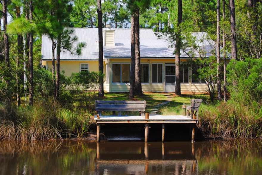 Cute Seagrove cottage located along Eastern Lake with 60 feet of lake frontage! One story, 3 bedroom, 2 bath with large garage, with huge 'Florida Room' facing Eastern Lake. Dock is in place! Newly renovated master bath. Low cost to own, low taxes & low HOA! Walking distance to the beach accesses or, a short boat ride! ***Buyer is responsible for personally verifying details about this property. Any information contained in this listing is believed to be accurate but is not guaranteed.***
