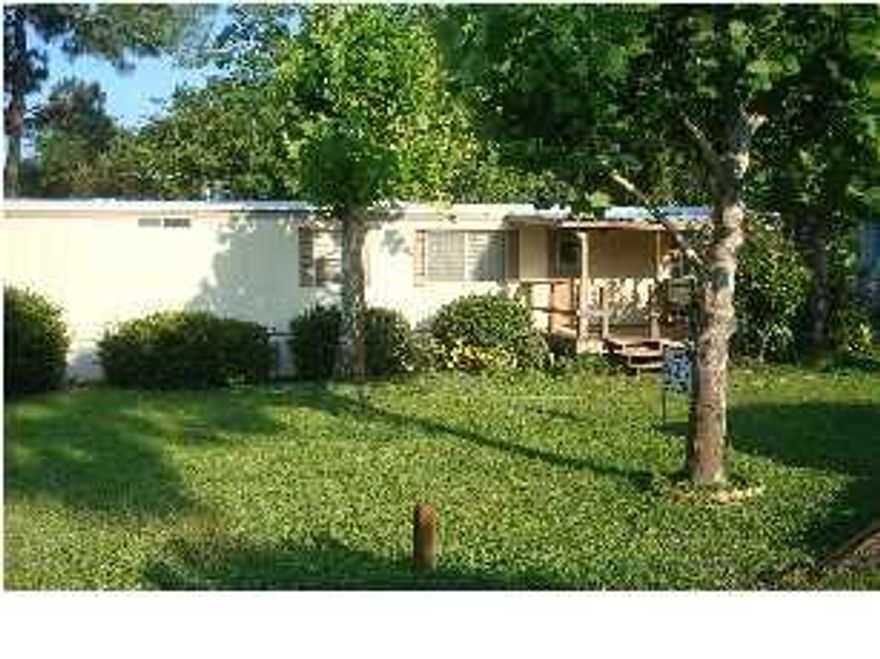 Nice trailer in Mary Esther. All tile. Deck on front and back. Washer and dryer hook-up inside home. Lawn pump and sprinkler system. This home requires water & electric. No smoking and no pets allowed.