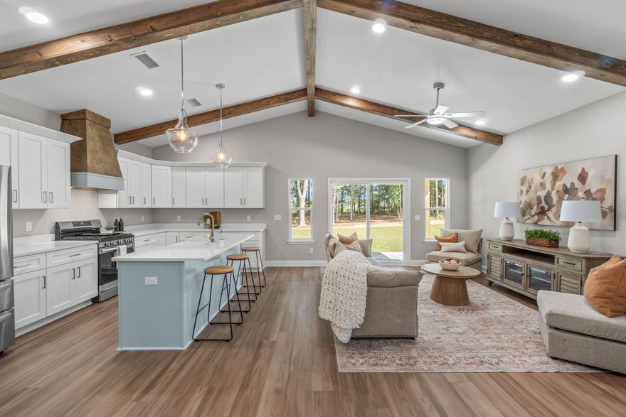 Welcome to a home that seamlessly blends craftsmanship, comfort, and the benefits of new construction--without the long wait. This semi-custom, Craftsman-inspired residence offers approximately 2,500 square feet of thoughtfully designed living space, featuring 4 bedrooms, 3.5 bathrooms, and a versatile loft area perfect for a desk, reading nook, or small home office. Now well underway and nearing completion, this home offers the convenience of a brand-new build with an anticipated finish at the end of April 2026. At the heart of the home is the open-concept living area, where the kitchen flows effortlessly into the family room, highlighted by custom cypress wood beams that add warmth and architectural character. The chef's kitchen is designed for both everyday living and entertaining, featuring a gas range, butter pantry, generous workspace, and a tankless water heater for continuous hot water. The owner's suite serves as a true retreat, complete with a spa-inspired bathroom that includes a freestanding soaking tub and a beautifully tiled walk-in shower--creating a space that feels both relaxing and refined. Thoughtful design and quality craftsmanship are evident throughout the home, offering a well-balanced layout that suits both daily living and entertaining. Estimated completion: End of April 2026. Photos shown are of similar completed homes and are for illustrative purposes only. Final finishes may vary. If you've been searching for new construction with character, this is an opportunity you won't want to miss.