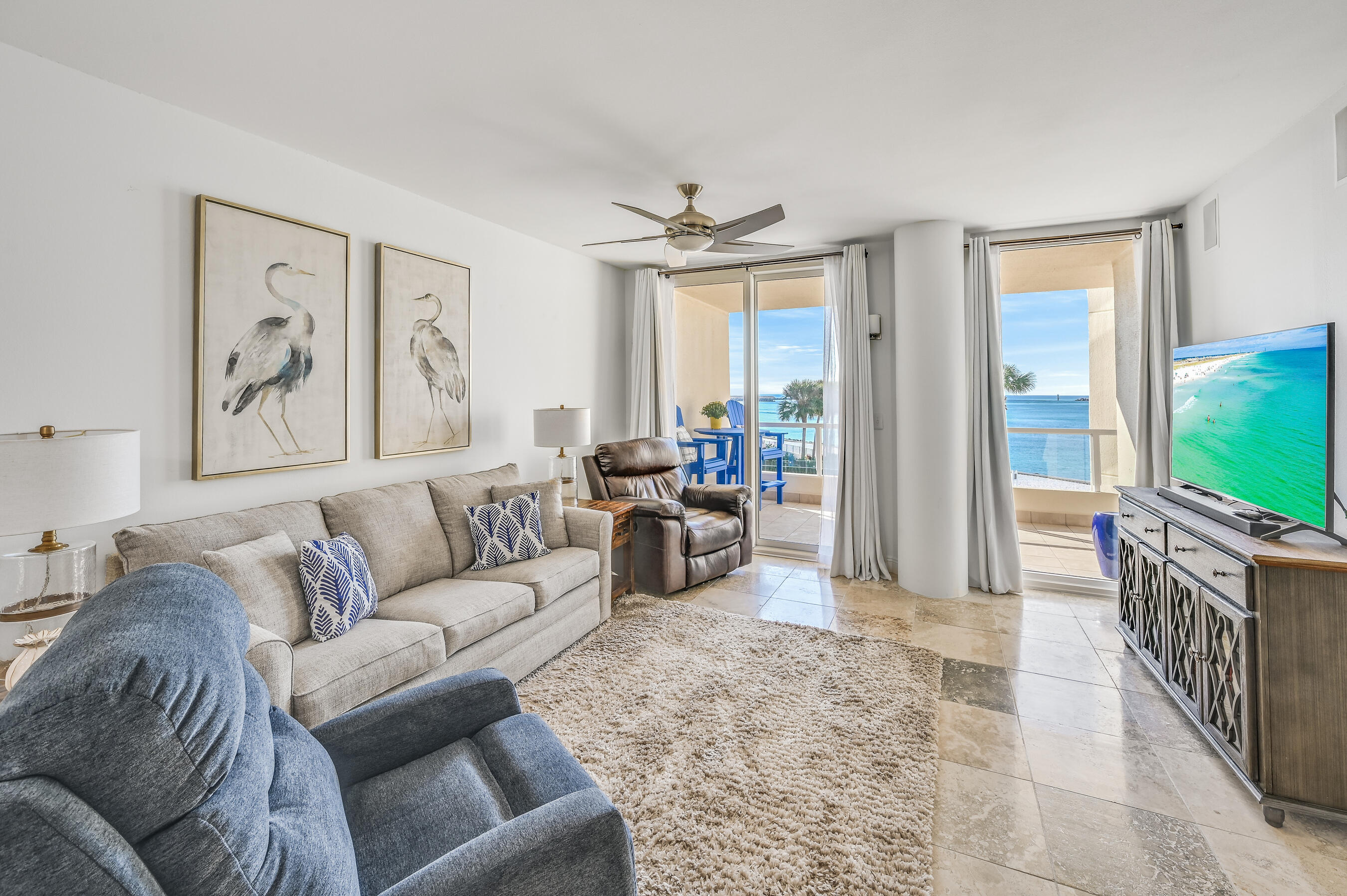 Beautiful two bedroom, two bath unit at East Pass Towers II. These units don't come on the market often! Tower II is rental restricted and is very private! The seller has updated the unit and it is being offered furnished excluding a few items (you can find a list of exclusions in the documents. This unit offers amazing Destin Pass and Jetty views, has surround sound throughout, beautiful travertine flooring and much more. The building is equipped with a fitness center, club suite and a large pool deck with pool and hot tub. This unit will come complete with an assigned covered parking space and storage unit under the building to store your beach gear!