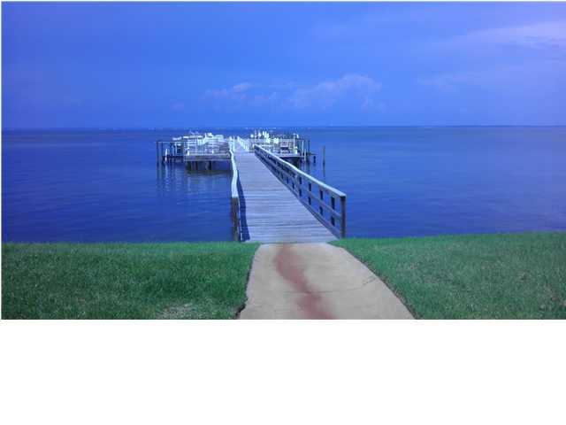MUST SEE!!! Beautiful completely renovated 2 Bedroom, 2 Bathroom condo located in the Heart of Destin on Choctawhatchee Bay. Owner has secured the lease on a 24' boat slip until August 2015. New stainless appliances and new granite countertops in the kitchen, new textured walls and ceilings, new crown molding, new paint throughout, new ceiling fans, new light fixtures, all new updated interior doors and new inside & outside AC unit November 2013. The patio, with an option to close the doors, has breath taking views of the gorgeous Bay and pristine pool. Just down the hall you will find the laundry room and a 4'X5' locked personal storage unit. The condo amenities include pool, clubhouse with full kitchen, large dock where boat slips can be purchased