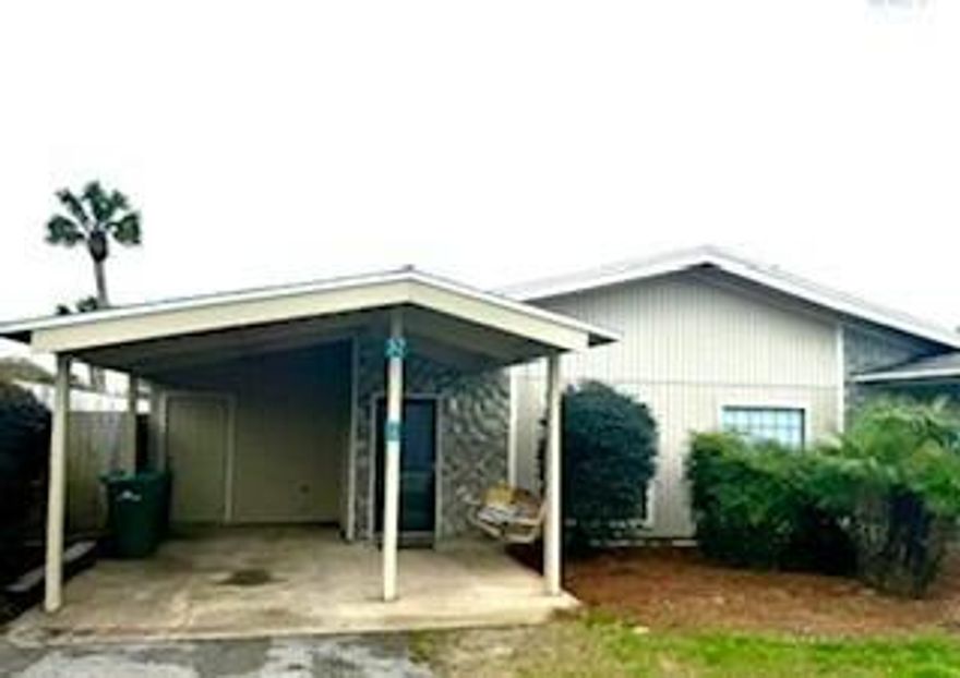 Wonderful end unit on private street in the Tennis Village section of  Seascape. This 2 bedroom, 2 bathroom condo is being sold ''AS IS''. It features an open carport, an open living area with vaulted ceiling. Enjoy your private fenced patio. And if you're a tennis lover, the property is next to the tennis court.