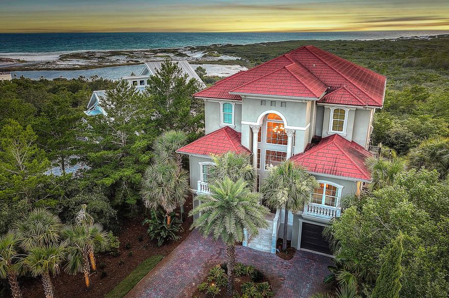 This 5 bedroom Mediterranean beauty is artfully situated on the edge of Topsail Preserve offering unparalleled panoramic views extending through the Preserve, over Lake Stallworth, and straight into the Gulf of Mexico. This custom home is reserved for the most discerning taste providing complete luxury in concert with a flexible family lifestyle. Three levels of lounging are all accessible by elevator. Amenities include a private guest quarter, double car garage, gas firepit, pool with spa, summer kitchen, and a custom chefs kitchen. The third floor offers a unique four seasons media room with an outside deck for additional bistro dining with unsurpassed views. This ultimate custom home also provides close and easy access to our beautiful beaches.