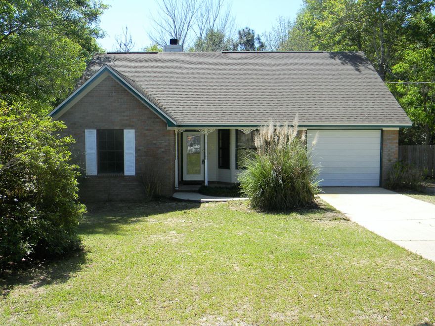 Priced to sell! Request a showing before it's gone! Located in southwest Crestview, this home is near all the conveniences of Military bases, shopping and restaurants. 3 bedrooms, 2 bathrooms and a large Florida room invite the opportunity for a little TLC to make it your own. A large living room area features a bay window, fireplace and high ceilings. Siding and back deck need some additional work.