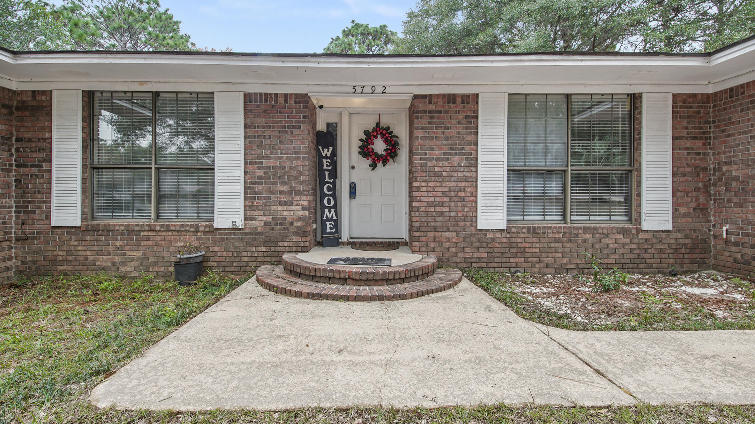 Tons of potential!! Four (4) bedrooms inside this large all brick home on just under an acre. Quiet beautiful neighborhood with fully fenced back yard all within minutes of schools, shopping and I-10. (Beautiful professional pics coming soon)