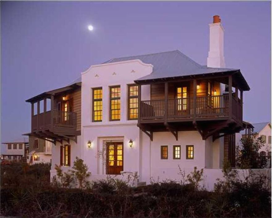 Selected from over 400 entries to win Southern Living's prestigious 'Southern Homes Award' in 2003, this Eric Watson designed house is one of the gems in Rosemary Beach. Its spacious rooms and tasteful decor provide just the right setting for a beach retreat. The first floor consists of an open living area, with a fireplace and entertainment center, adjoining a professionally-equipped kitchen. This house makes excellent use of space providing great common areas for the family as well as quiet places for relaxation. The Master bedroom is on the first floor. The upstairs bedrooms adjoin a banister-lined walkway overlooking the living area below and open onto private, gracious balconies and a refreshing Gulf breeze. There are three balconies and two patios.